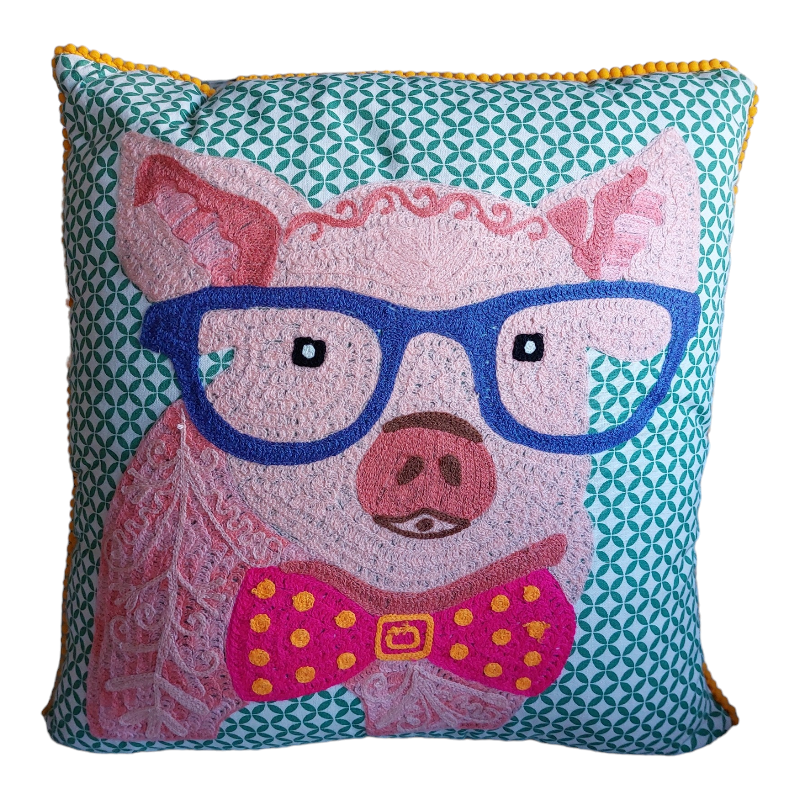 kussen met kleurrijke varkenskop met een bril