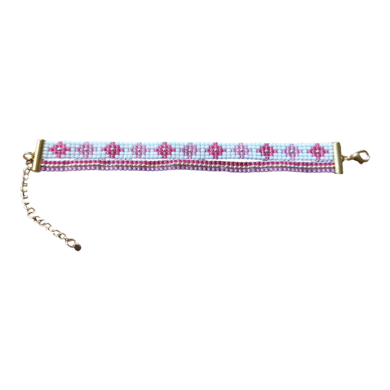 kralenarmbandje met bloemetjes patroon en een extra kralenbandje erbij